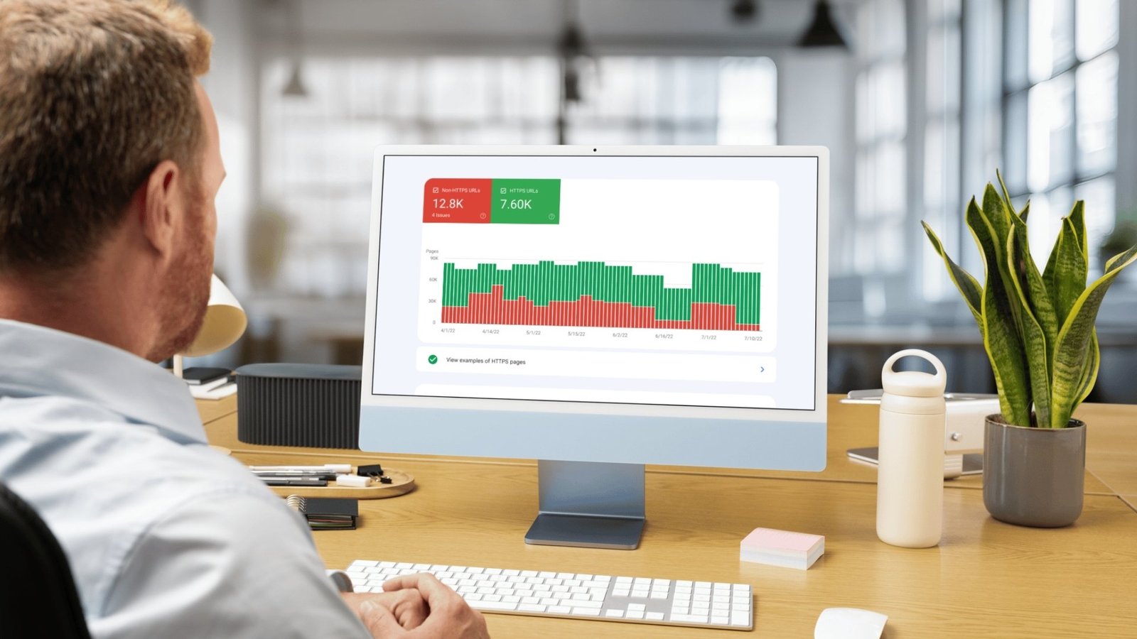 Person analyzing data on computer screen